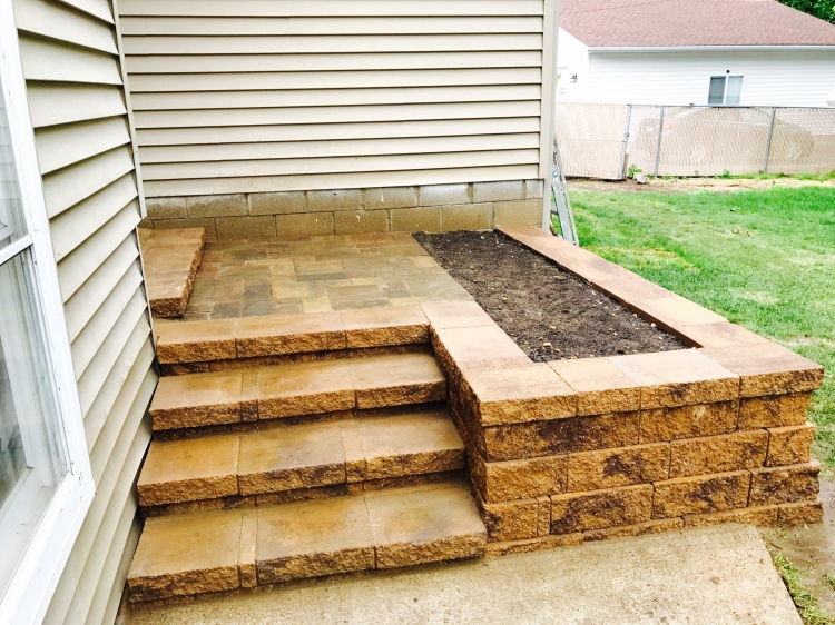 Beautiful block staircase with build in planting bed.