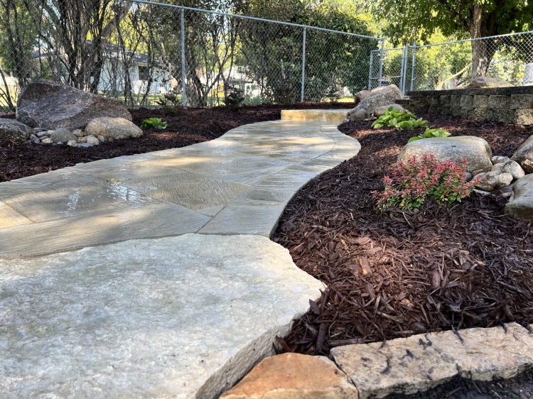 Beautiful county materials textured pavers with natural Eden natural stone steps.