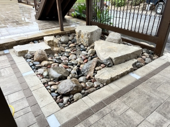 Hidden sump pump drainage system.