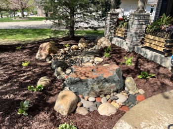 pond-less boulder bubbler built out of granite boulder.