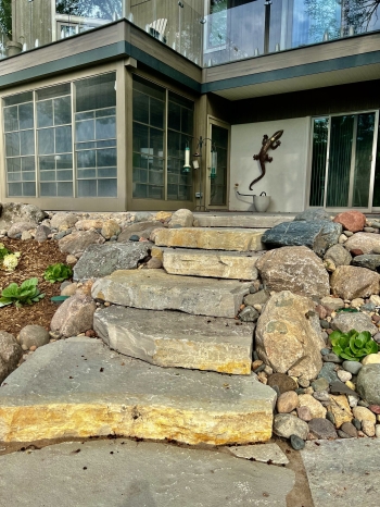 Eden irregular natural stone staircase with fieldstone boulder outcroppings