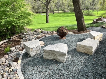 Intimate fire pit area with a beautiful river view. 